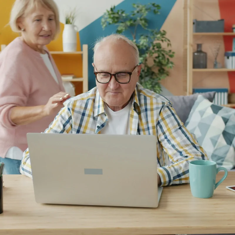 An elderly florida couple looking up medicare supplement insurance options