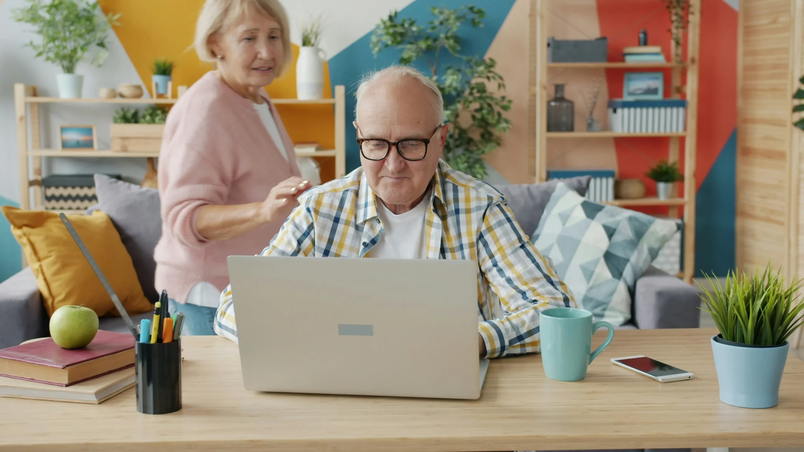 An elderly florida couple looking up medicare supplement insurance options