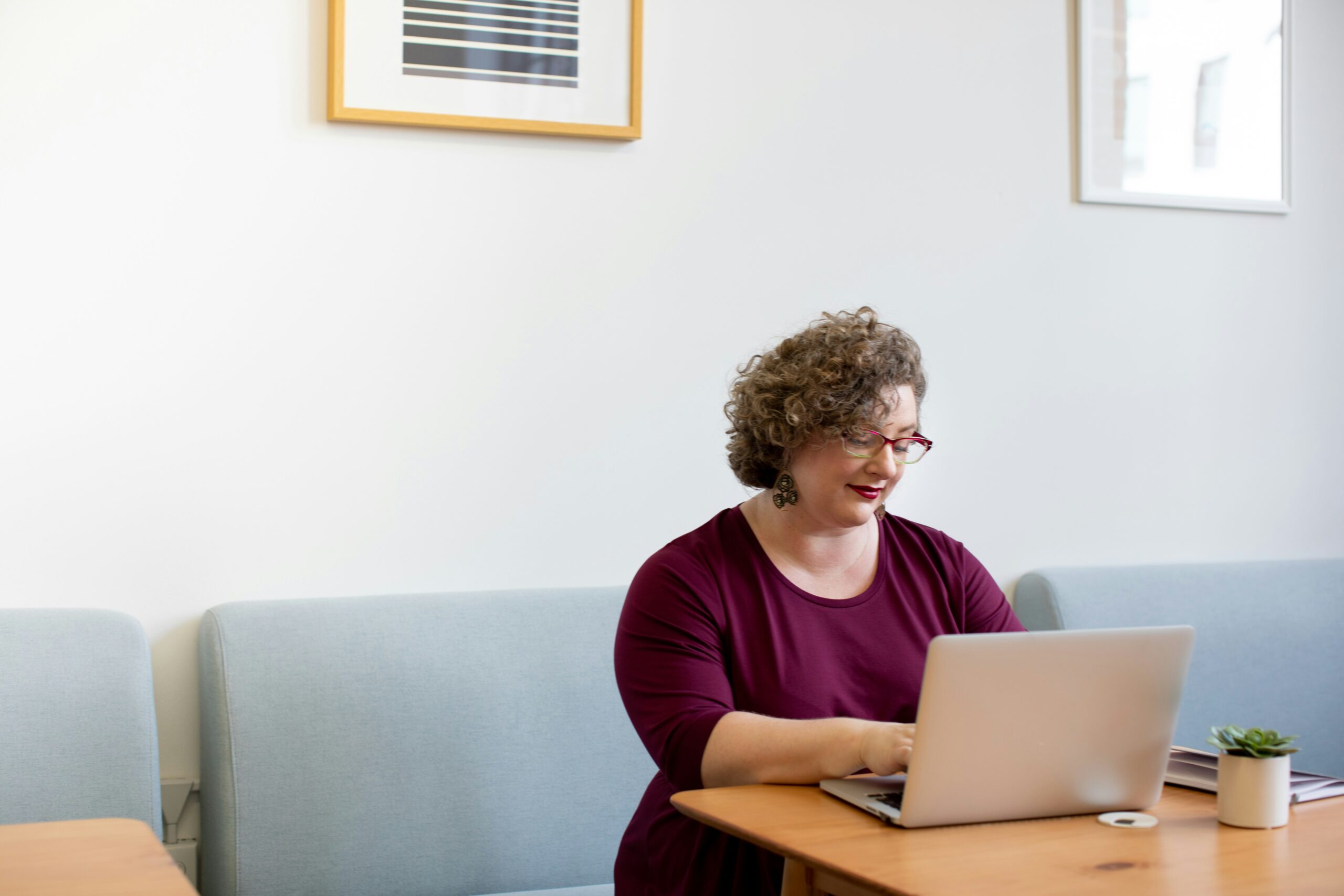An individual researching options on a laptop, representing how individuals and families find the right health insurance plan in Florida.
