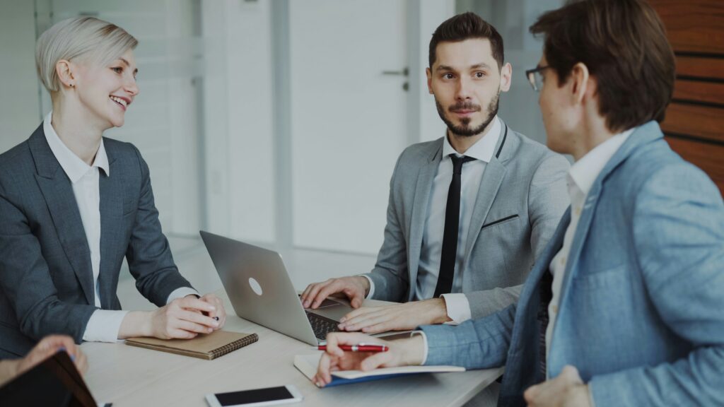 vitaly gariev UDzHS34PTQ0 unsplash | ProCare Consulting Business professionals meeting with ProCare Consulting to compare healthcare strategies and evaluate small group insurance options for their company.