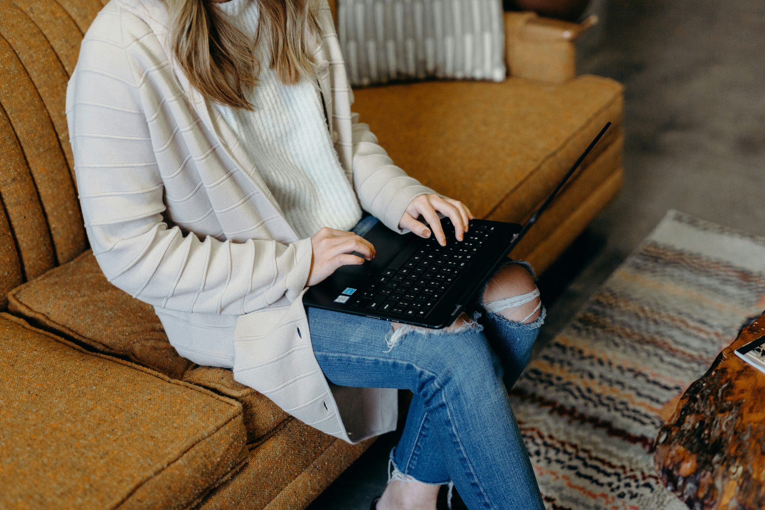 Person researching Medicare Supplemental Plans in Florida on a laptop. | ProCare Consulting Person researching Medicare Supplemental Plans in Florida on a laptop.