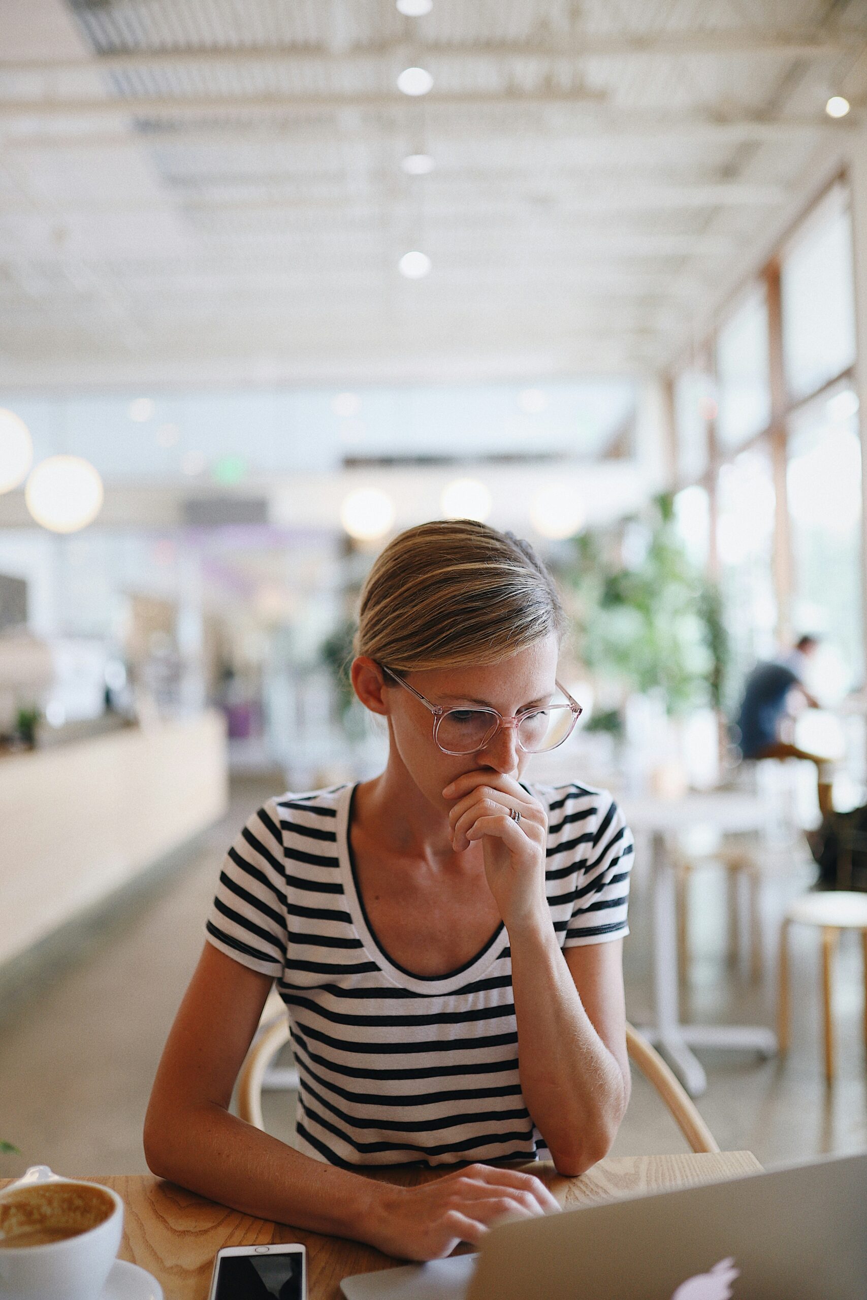 Woman researching health insurance coverage options online.