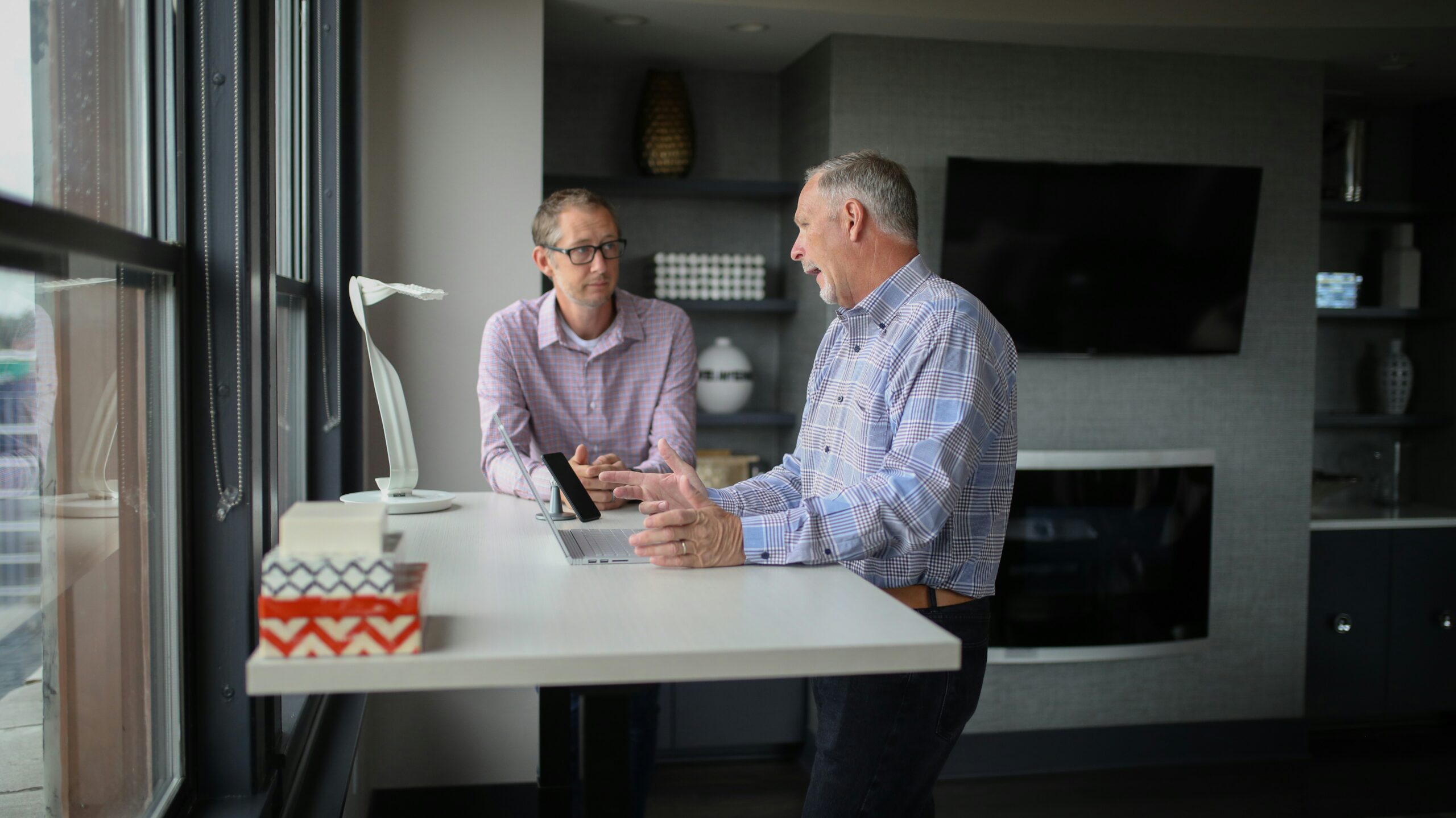 Advisor explaining Medicare Supplement coverage options to a senior client.