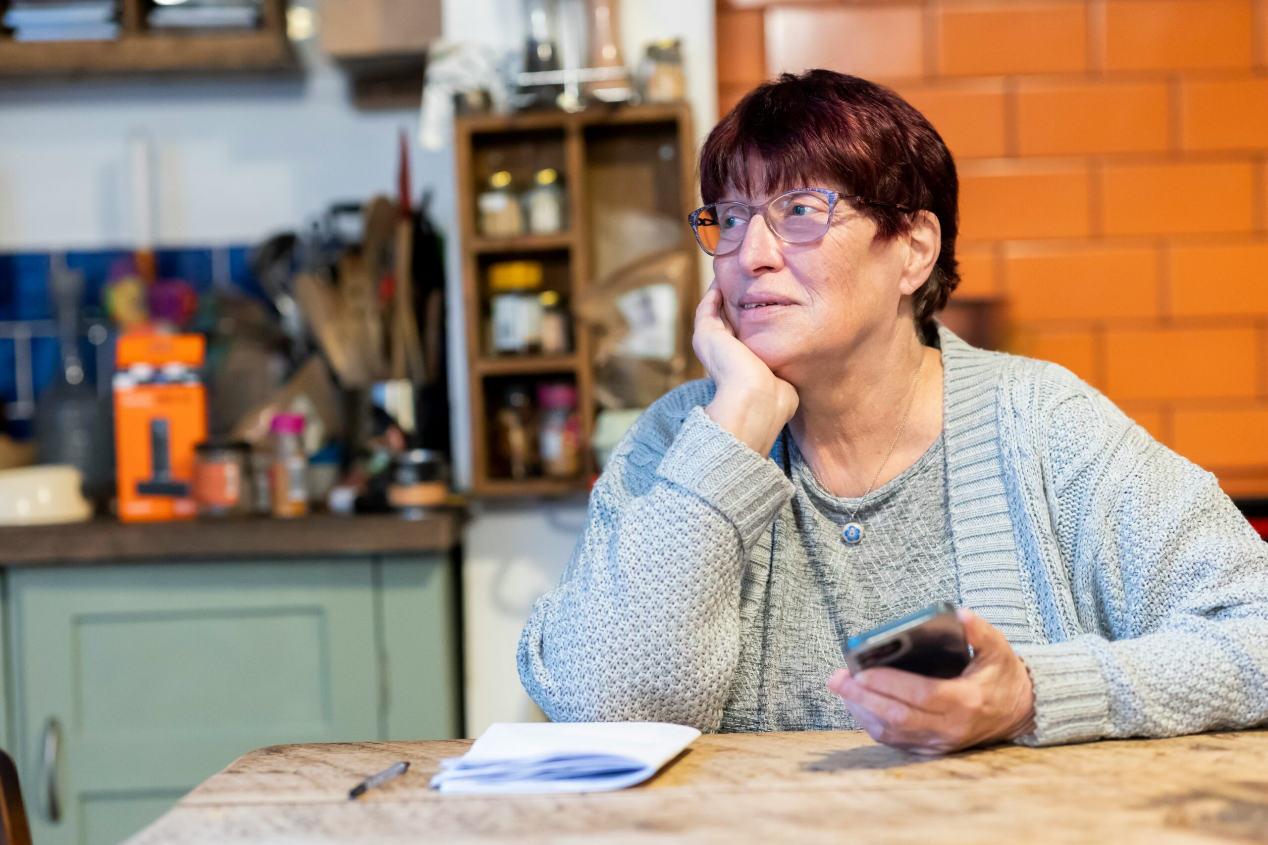 Senior woman reviewing health insurance and Medicare coverage information | ProCare Consulting Senior woman reviewing health insurance and Medicare coverage information