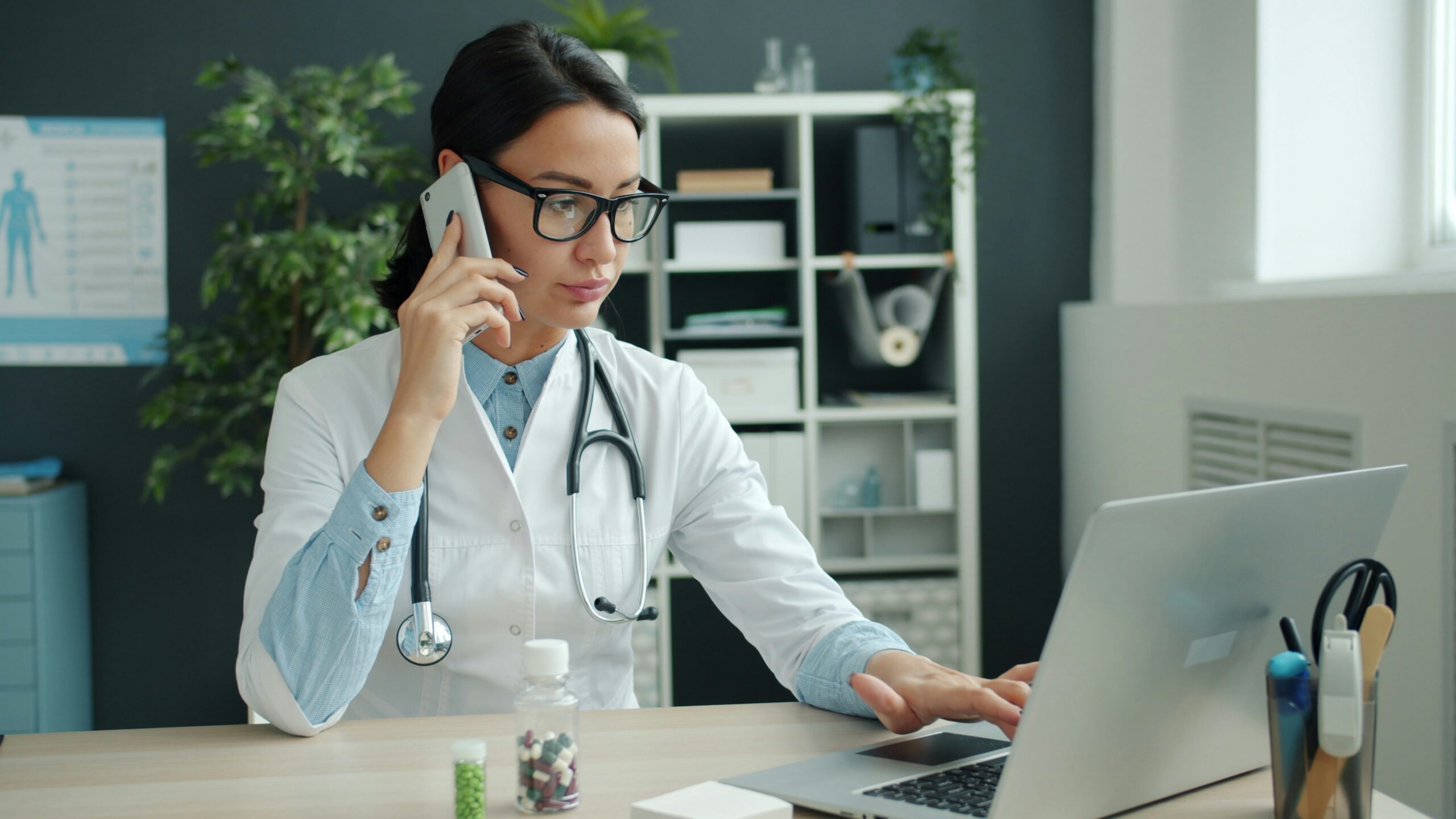 healthcare worker on call reviewing documents