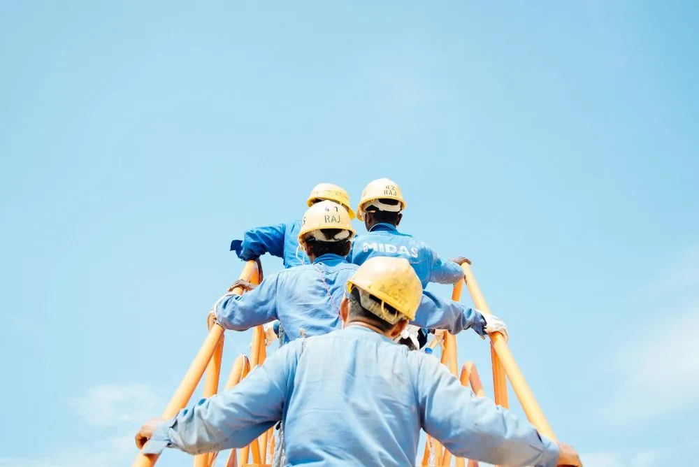 workers on a ladder