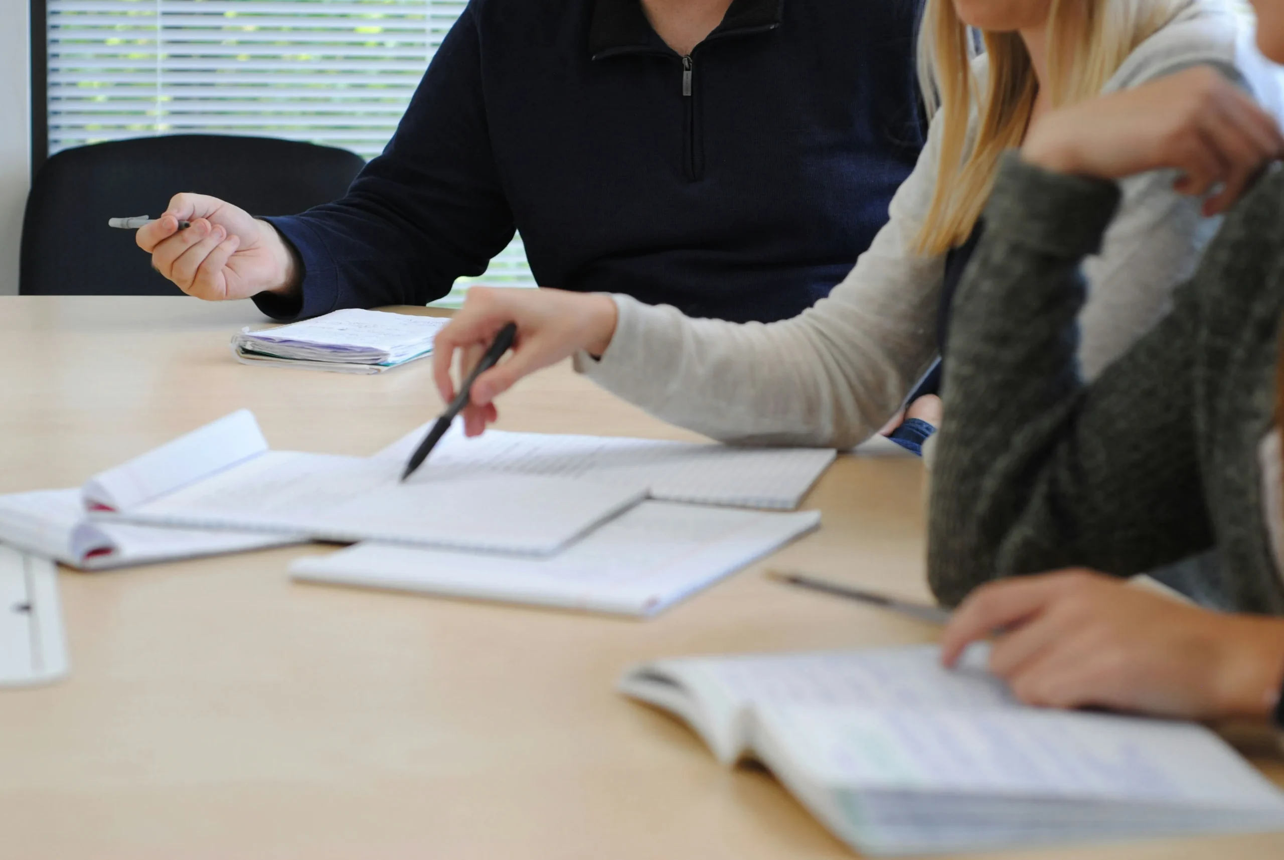 People comparing Medicare drug plan documents | ProCare Consulting People comparing Medicare drug plan documents