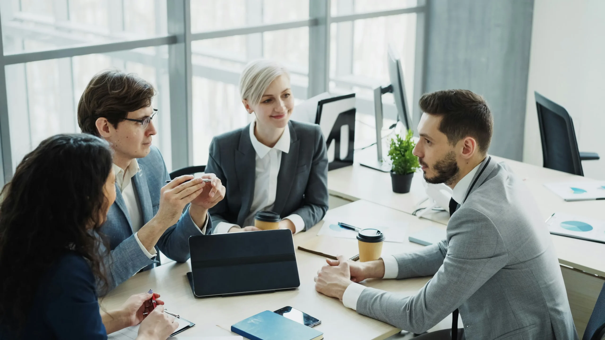 Business team discussing employee health benefits in an office