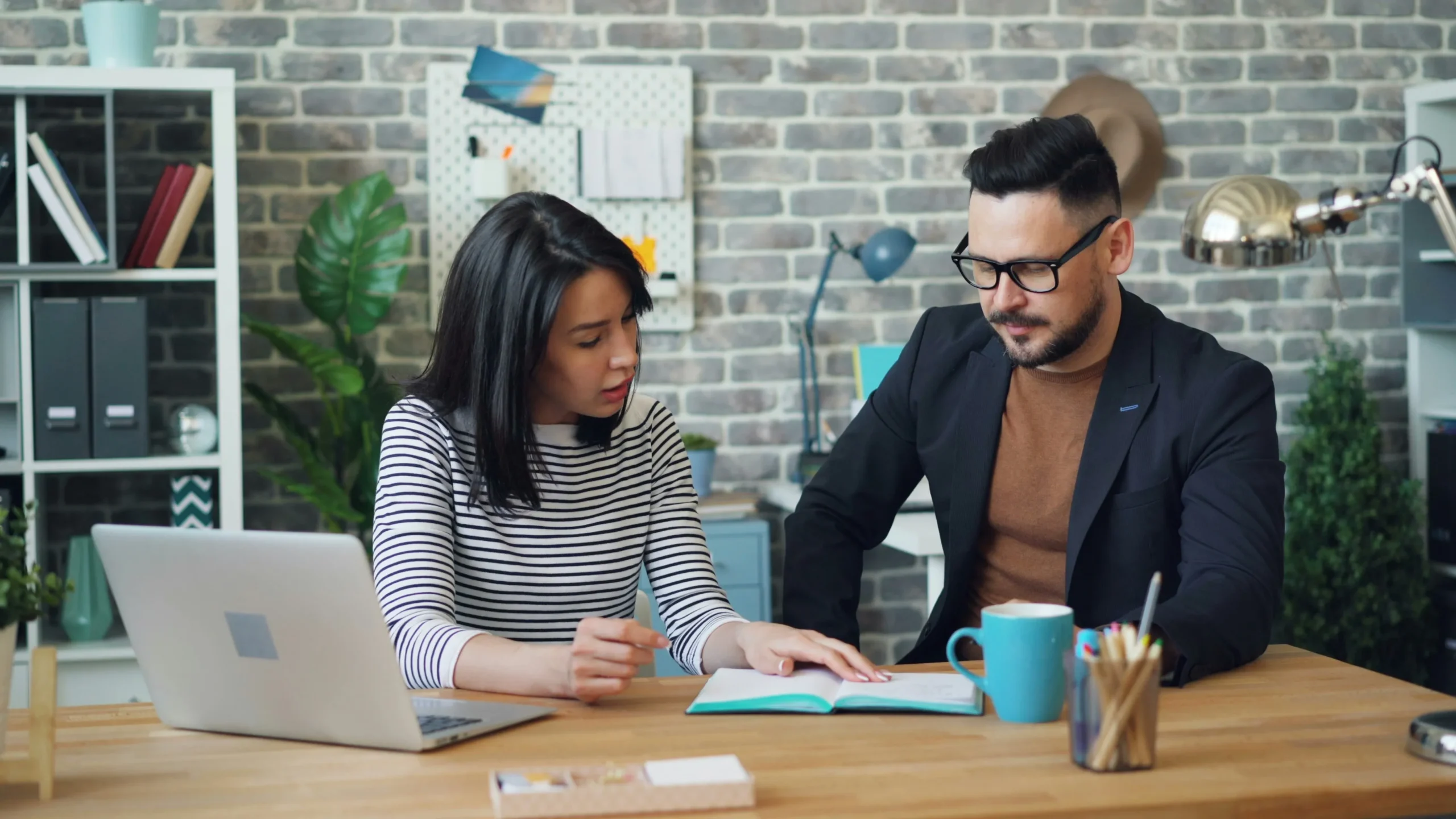 Two people reviewing coverage options together