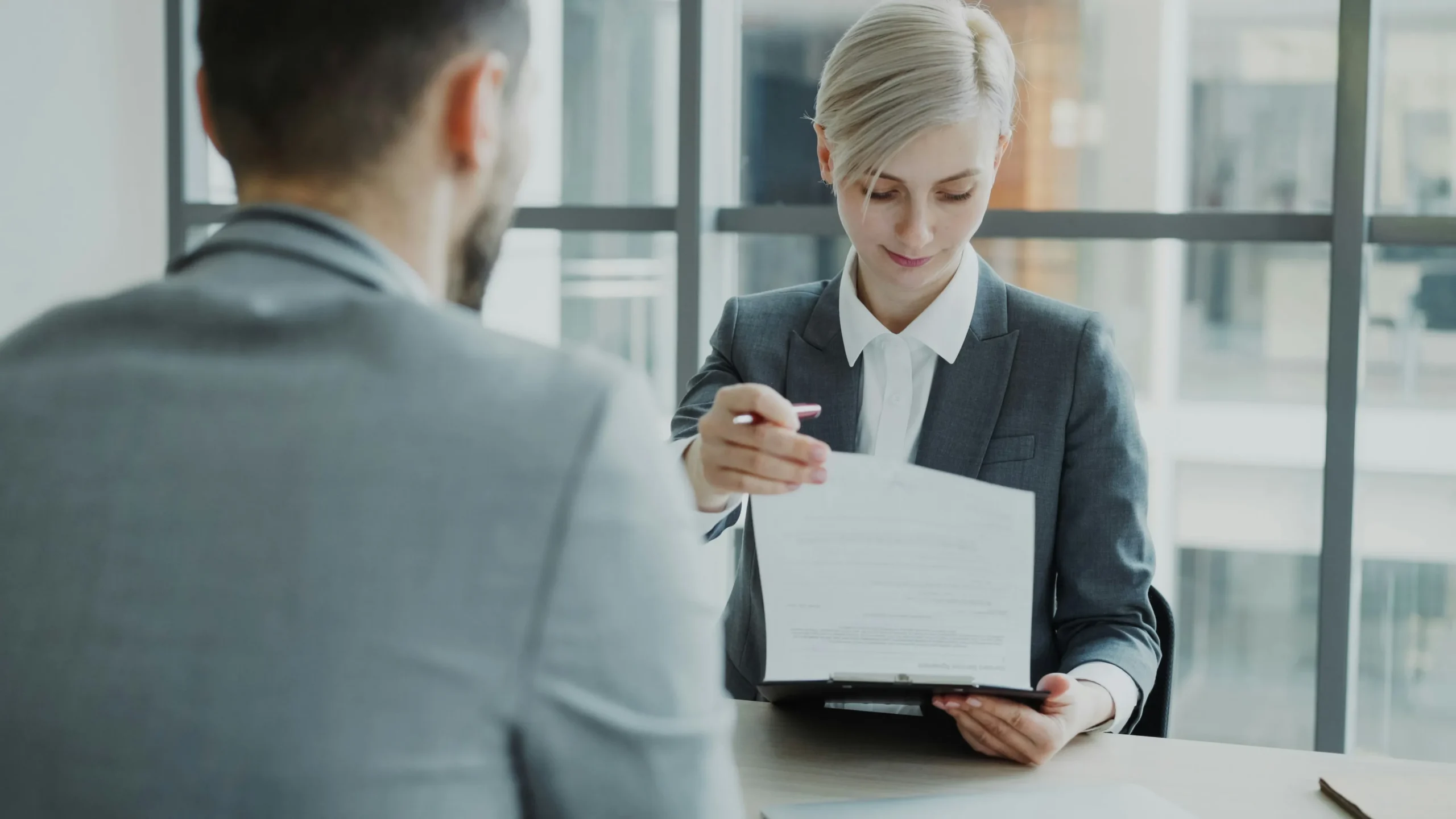 Advisor reviewing provider details with a client | ProCare Consulting Advisor reviewing provider details with a client