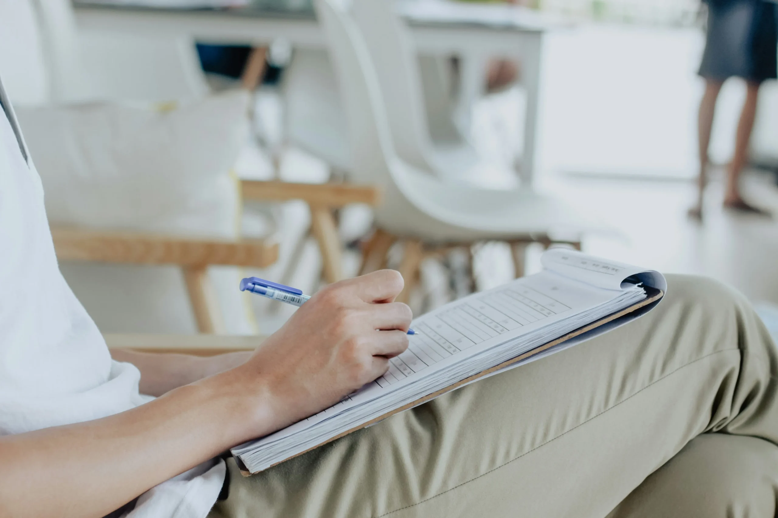 Person checking medications on a written list | ProCare Consulting Person checking medications on a written list