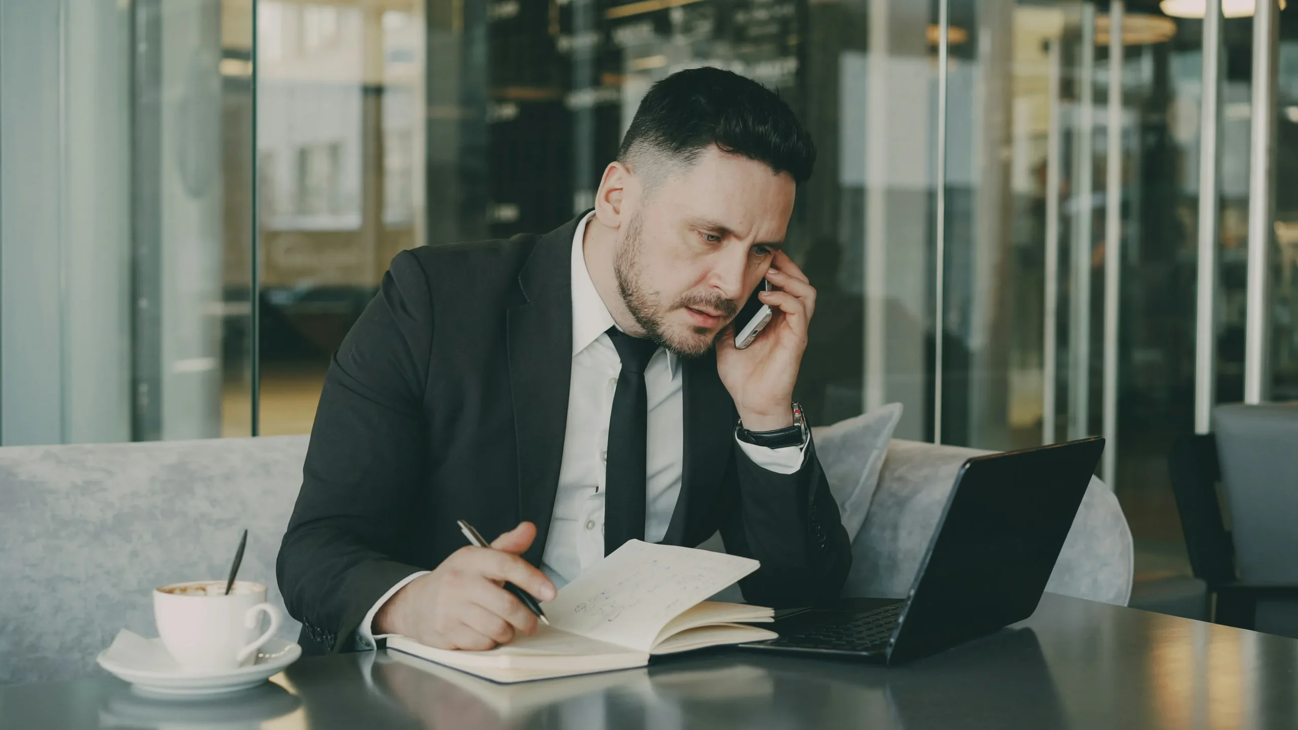 Man verifying network details during a call | ProCare Consulting Man verifying network details during a call