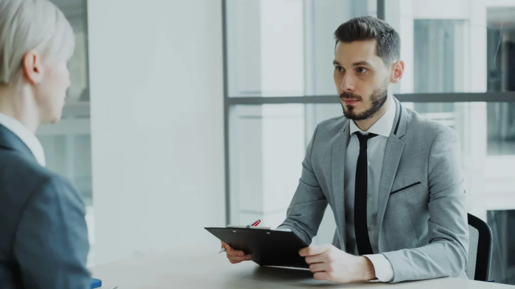Business owner meeting with an advisor to review employee benefits